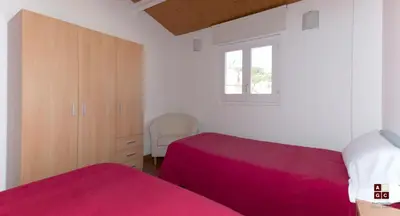 Cama o camas de una habitación en Apartaments Girona Centre