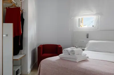 Cama o camas de una habitación en Hotel hcp