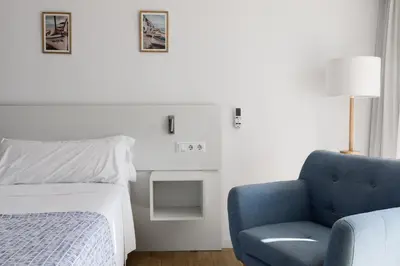 Cama o camas de una habitación en Hotel hcp