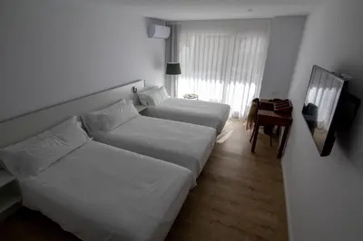 Cama o camas de una habitación en Hotel hcp