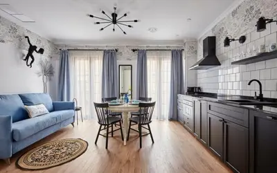 Una cocina o zona de cocina en Parrot’s House