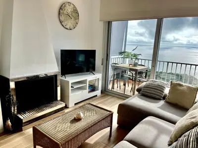 Una televisión o centro de entretenimiento en LA CASA BLUE , Mediterranean Boutique-Villa in Santa Cristina Beach