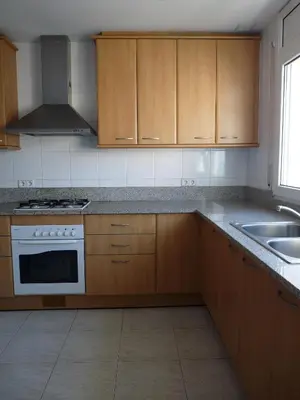 Una cocina o zona de cocina en Apartaments Tropic