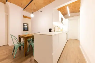 Una cocina o zona de cocina en Bravissimo Cort Reial Entresol A