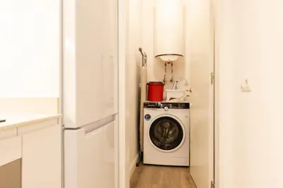 Una cocina o zona de cocina en Bravissimo Cort Reial Entresol A
