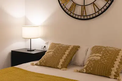 Cama o camas de una habitación en Bravissimo Cort Reial Entresol A