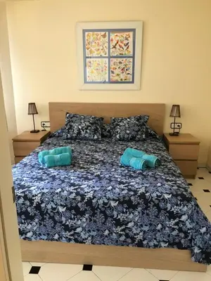 Cama o camas de una habitación en Precioso apartamento en S'Agaró con fantásticas vistas al mar