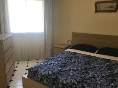 Cama o camas de una habitación en Precioso apartamento en S'Agaró con fantásticas vistas al mar