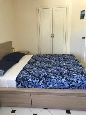 Cama o camas de una habitación en Precioso apartamento en S'Agaró con fantásticas vistas al mar