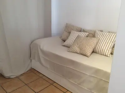 Cama o camas de una habitación en Estudio cerca del mar con terraza