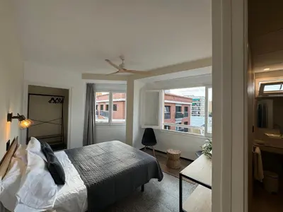 Cama o camas de una habitación en Hostal Santa Ana