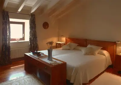 Cama o camas de una habitación en Luxuriously restored farmhouse near Girona in the heart of Catalunya