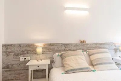 Cama o camas de una habitación en Bravissimo Sant Pau, cozy apartment in the centre