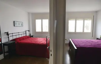 Cama o camas de una habitación en Duplex en frente de la playa al lado de Barcelona