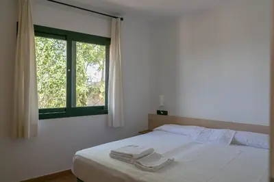 Cama o camas de una habitación en 2 bedroom apartment in Begur center. Sea views terrace and pool Ref:H09