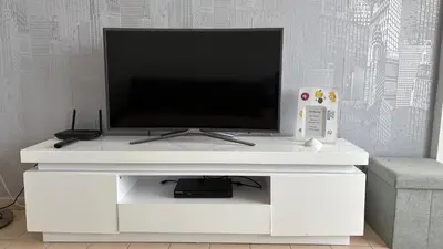 Una televisión o centro de entretenimiento en Apartments Paradise Lloret