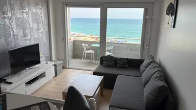 Una televisión o centro de entretenimiento en Apartments Paradise Lloret