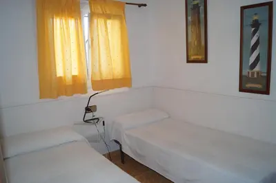 Cama o camas de una habitación en Mango