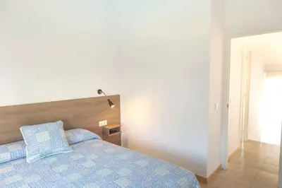 Cama o camas de una habitación en Casa 11 - Parc Sant Ramon, descanso y armonía