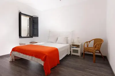 Cama o camas de una habitación en Lets Holidays COZY HOUSE in the CENTER of TOWN