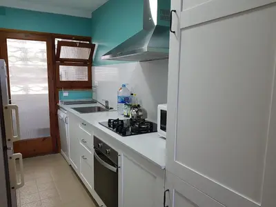 Una cocina o zona de cocina en E-2 CALELLA DE PALAFRUGELL 8 PAX