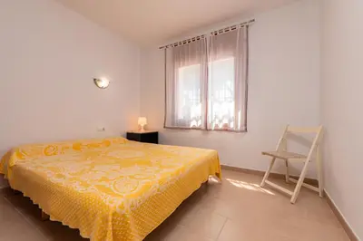 Cama o camas de una habitación en E-2 CALELLA DE PALAFRUGELL 8 PAX
