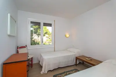 Cama o camas de una habitación en M-1 CALELLA DE PALAFRUGELL 4 PAX