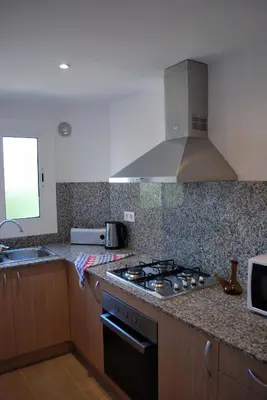 Una cocina o zona de cocina en Apartamentos Les Palmeres