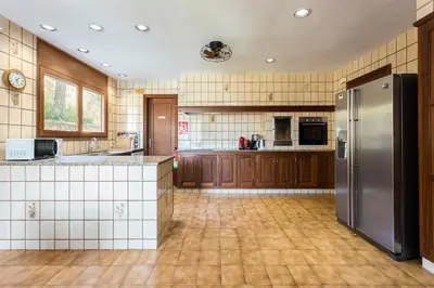 Una cocina o zona de cocina en Villa Maricel