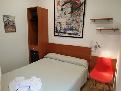 Cama o camas de una habitación en Hotel Mitus