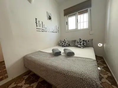 Cama o camas de una habitación en NICE APARTAMEN