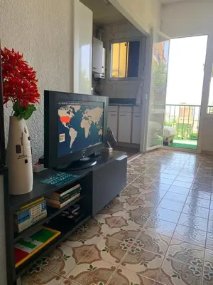 Una televisión o centro de entretenimiento en NICE APARTAMEN