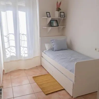 Cama o camas de una habitación en Apartament en Plaça Nova 2, Palafrugell