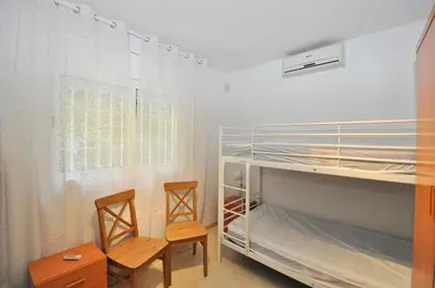 Cama o camas de una habitación en Villa Genova