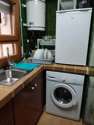 Una cocina o zona de cocina en Voramar D- Estudi