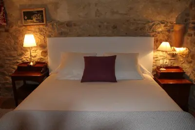 Cama o camas de una habitación en Mas Vilosa Bed and Breakfast