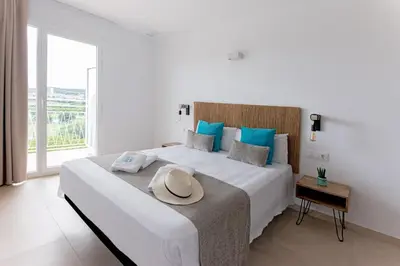 Cama o camas de una habitación en Bamblue Boutique Apartments