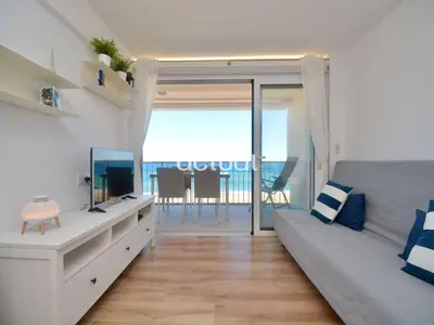Una televisión o centro de entretenimiento en Beach Palace B-2