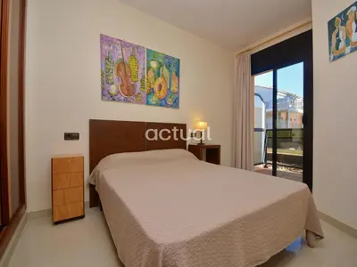 Cama o camas de una habitación en Xaloc Esc.B Bajos A