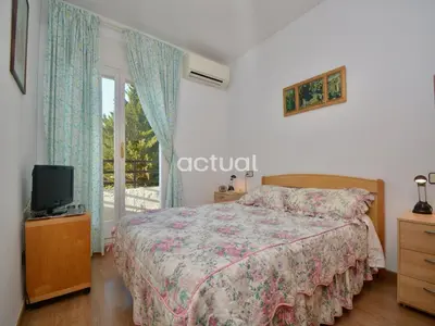 Cama o camas de una habitación en Las Palomas Esc. A 1-1