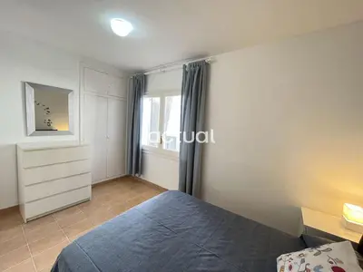 Cama o camas de una habitación en Residencial S´Agaro Bajos Dcha