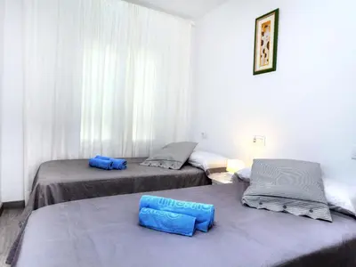 Cama o camas de una habitación en Apartment Cap Roig by Interhome