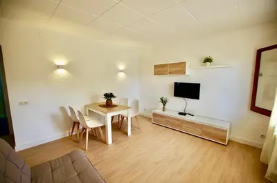 Una televisión o centro de entretenimiento en V&V LLORET- Apartamento Europa