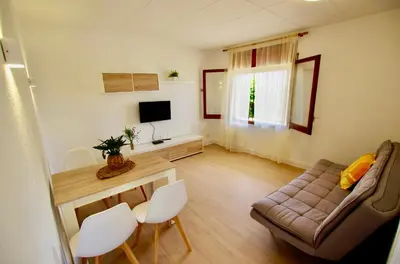 Una televisión o centro de entretenimiento en V&V LLORET- Apartamento Europa