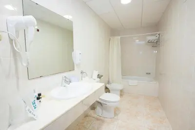 Un baño de Hotel - Bungalows Don Juan Tossa