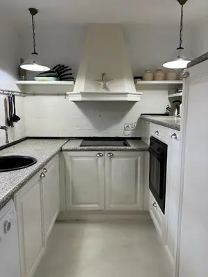 Una cocina o zona de cocina en Casa blanca de Begur con vistas al mar y piscina