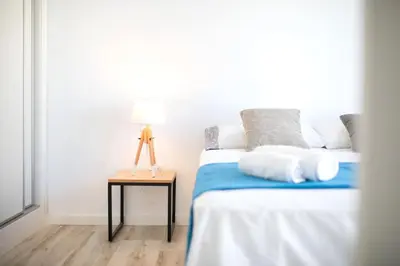 Cama o camas de una habitación en Flateli Sant Antoni 1