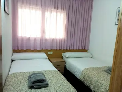 Cama o camas de una habitación en Apartamento Sun Garden Lloret de Mar
