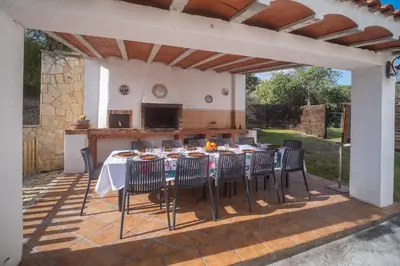 Un patio o zona al aire libre en Can Magan Ideal Familias y Grupos Piscina Privada Barbacoa