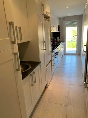 Una cocina o zona de cocina en Apartamento en S'agaró con piscina, ideal para familias